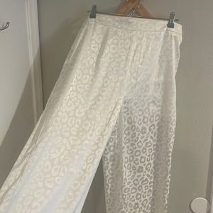 NASTY GAL collection white wide leg animal print satin pants. LIKE NEW